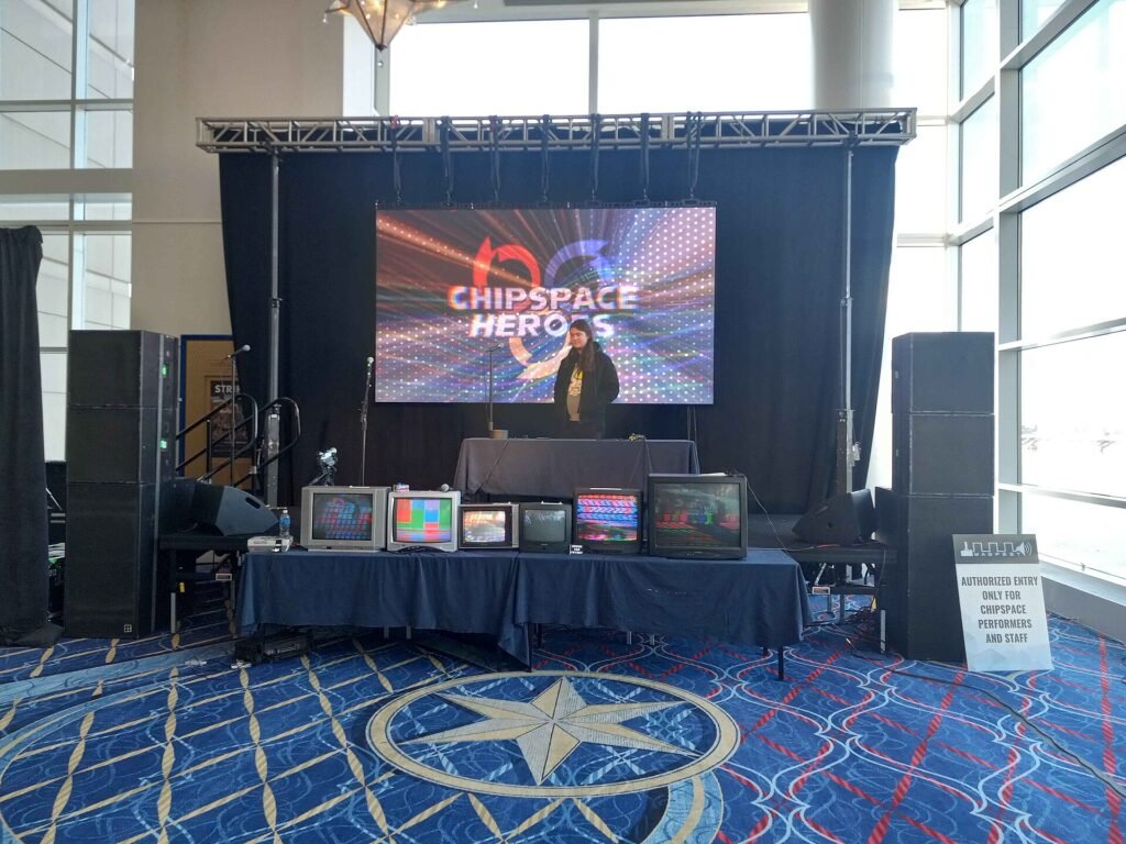 Open mic in the chipspace music area at MAGFest 2025